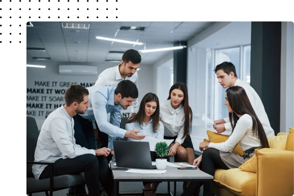 Team discussing strategic marketing outreach in a conference room