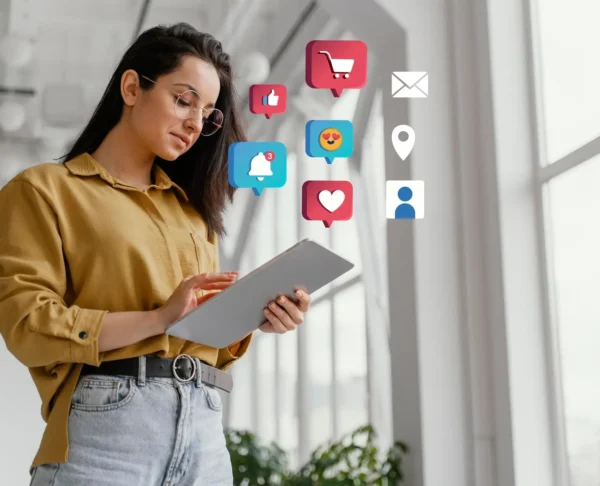 Woman analyzing social media marketing icons on digital tablet