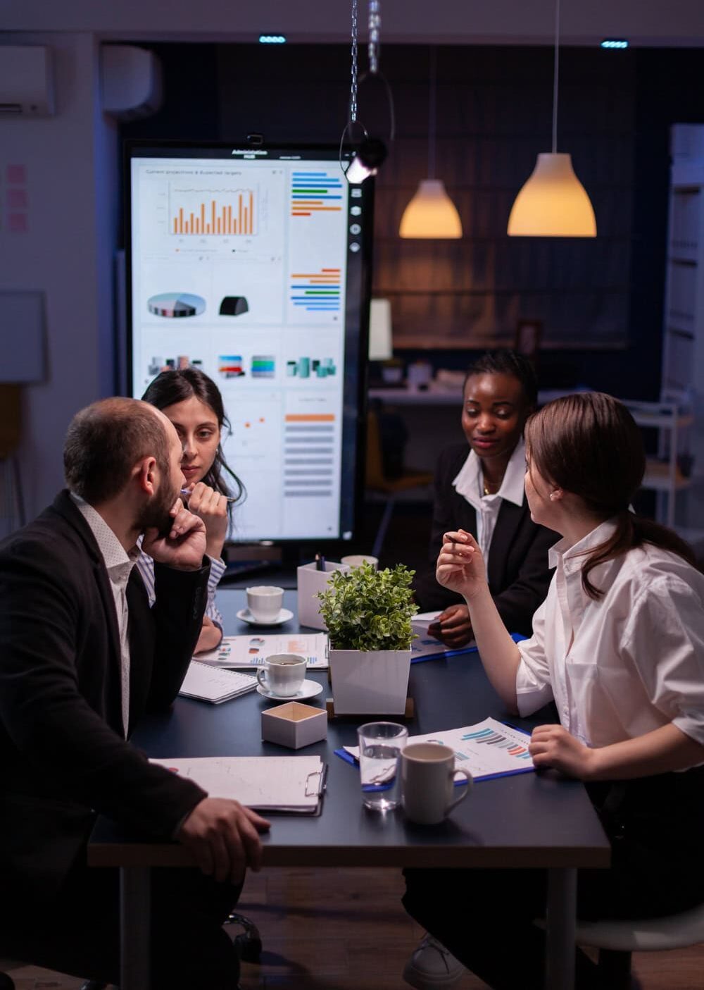 Team of digital marketers analyzing performance reports